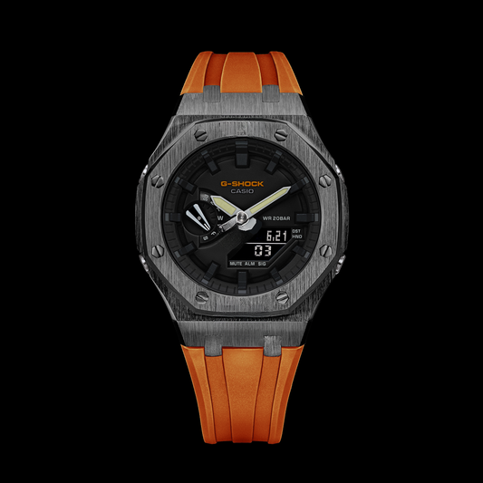 Gshock CasiOak Gunmetal - Cadran noir (bracelets en résine orange et index noirs)